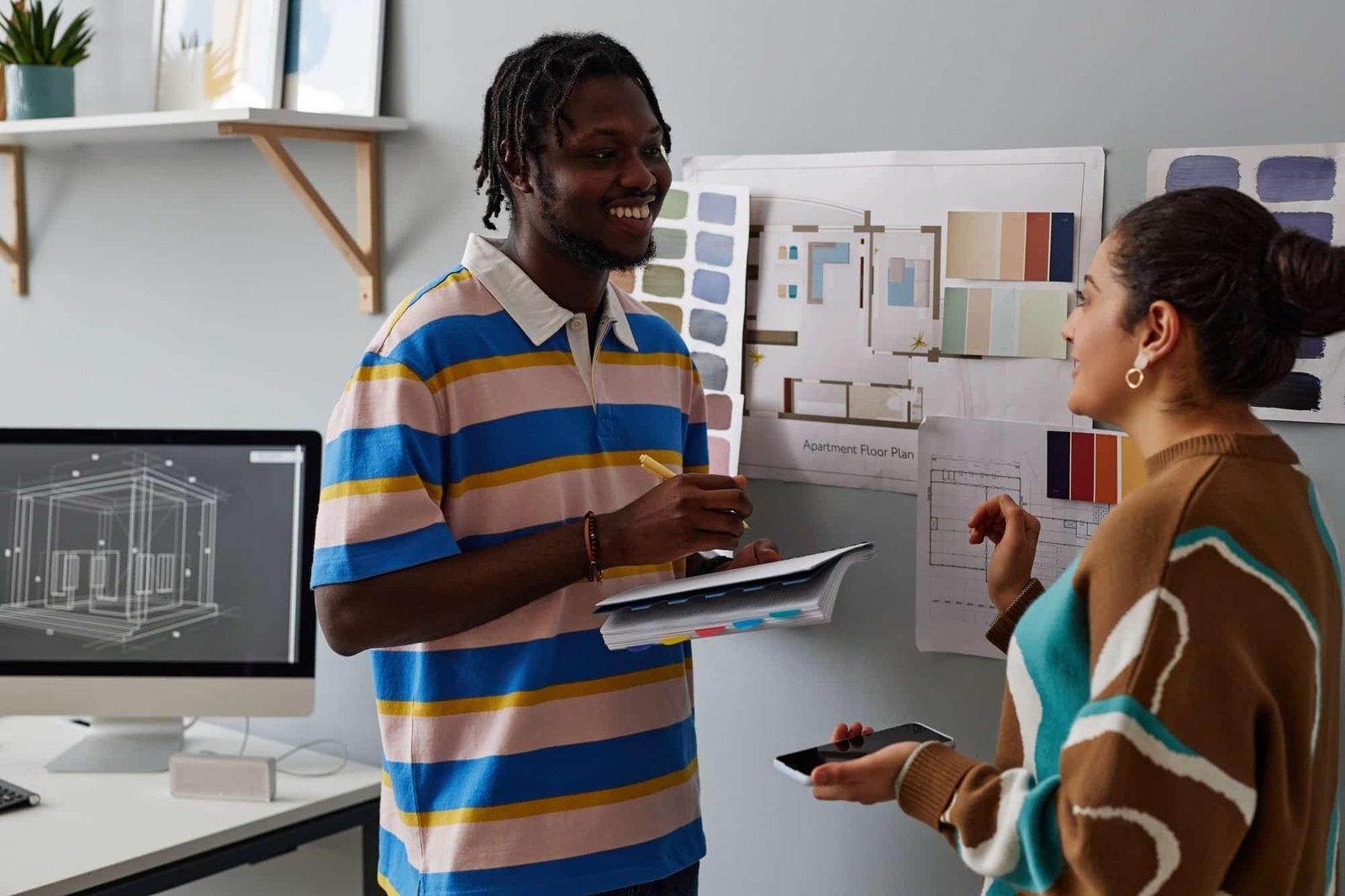 Designers planning construction project in office